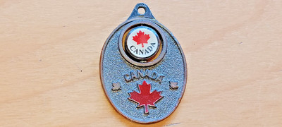 Kanada Canada Schlüsselanhänger Metall Innenteil drehbar aus Kunststoff  /  2574