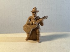 Marx VTG 1950's 60mm plastic sitting Chubby Cowboy playing guitar.