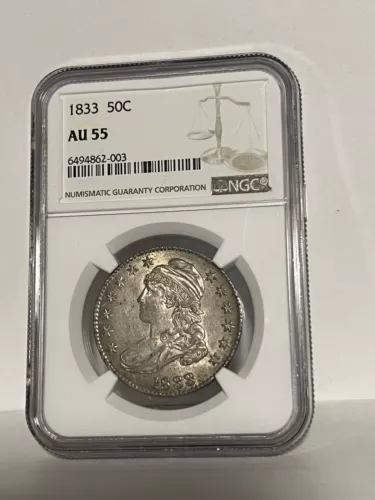 1833 US BUST HALF DOLLAR IN NGC AU55 ABOUT UNCIRCULATED CONDITION