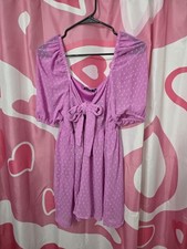 Boohoo sachet pink swiss dot smocked frilled neckline short sleeve dress.