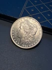 (#101122) Morgan Dollar: 1884 O   unc/bu.  Flashy.  See video.