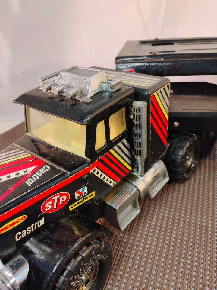 🔥Tractor de juguete de metal Remco Castrol STP Goodyear SEMI de los años 80 plataforma grande Foto 3 de 4