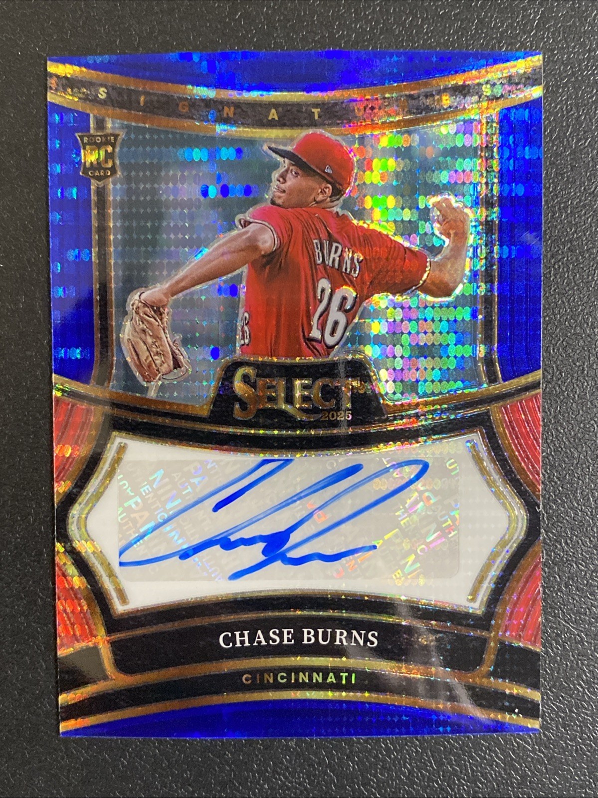 2025 Panini Select Chase Burns Blue Prizm Signatures Rookie Auto Card - Reds
