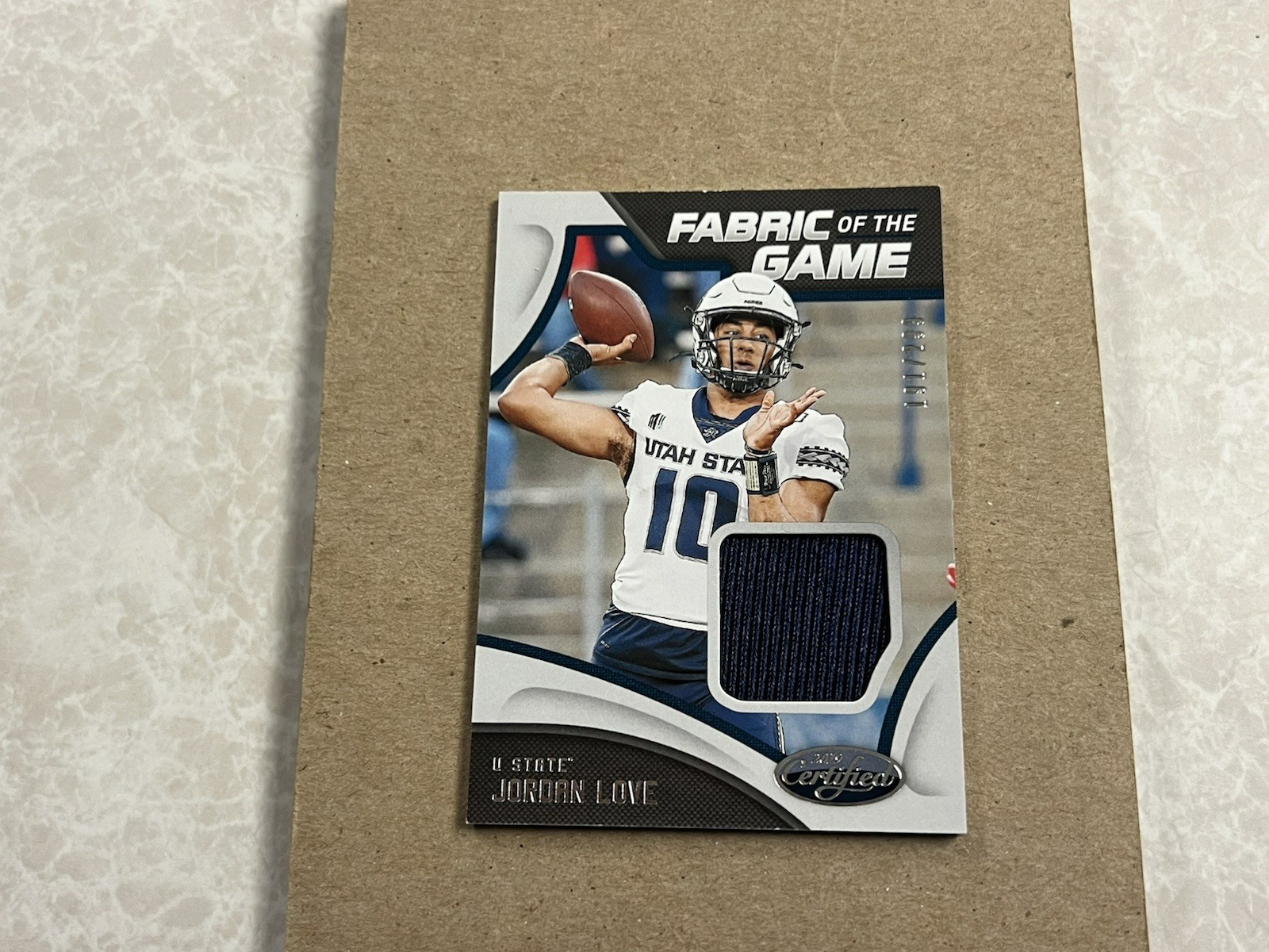Jordan Love Panini Chronicles Draft Picks Certified Collegiate Fabric of the Game #10 Base