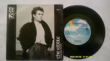 NIK KERSHAW - THE RIDDLE - 7" VINYL SINGLE.