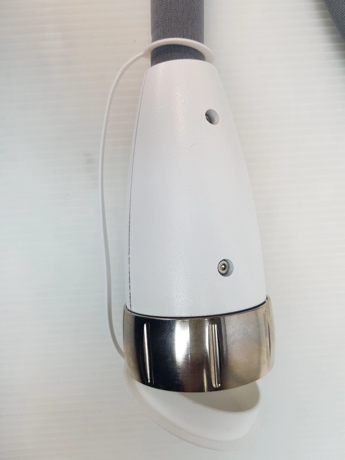 Connector housing of the M22 Q-Switched Nd:YAG head with protective cap