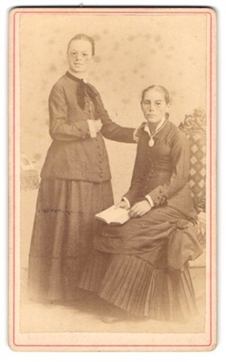 Photograph Two Young Ladies In Contemporary Wear 