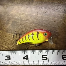 Mann’s Manns 1- Baby 1 Minus 3/8oz Chartreuse Orange Double Stamp Lure P04