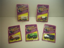 Lote de 5 camiones diecast Mighty Movers: camión de volteo Exxon de 7 unidades camión de cemento