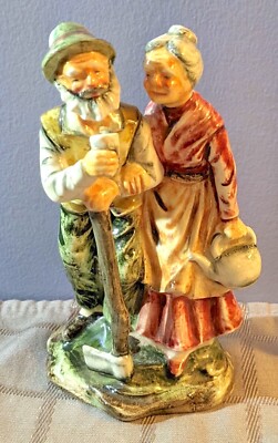 Vintage Ceramic Figurine of Older Woodsman Couple Axe and Watering Can 5'' Tall