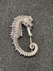 Vintage Carl Schon Sterling Silver Garnet Eye Seahorse Brooch