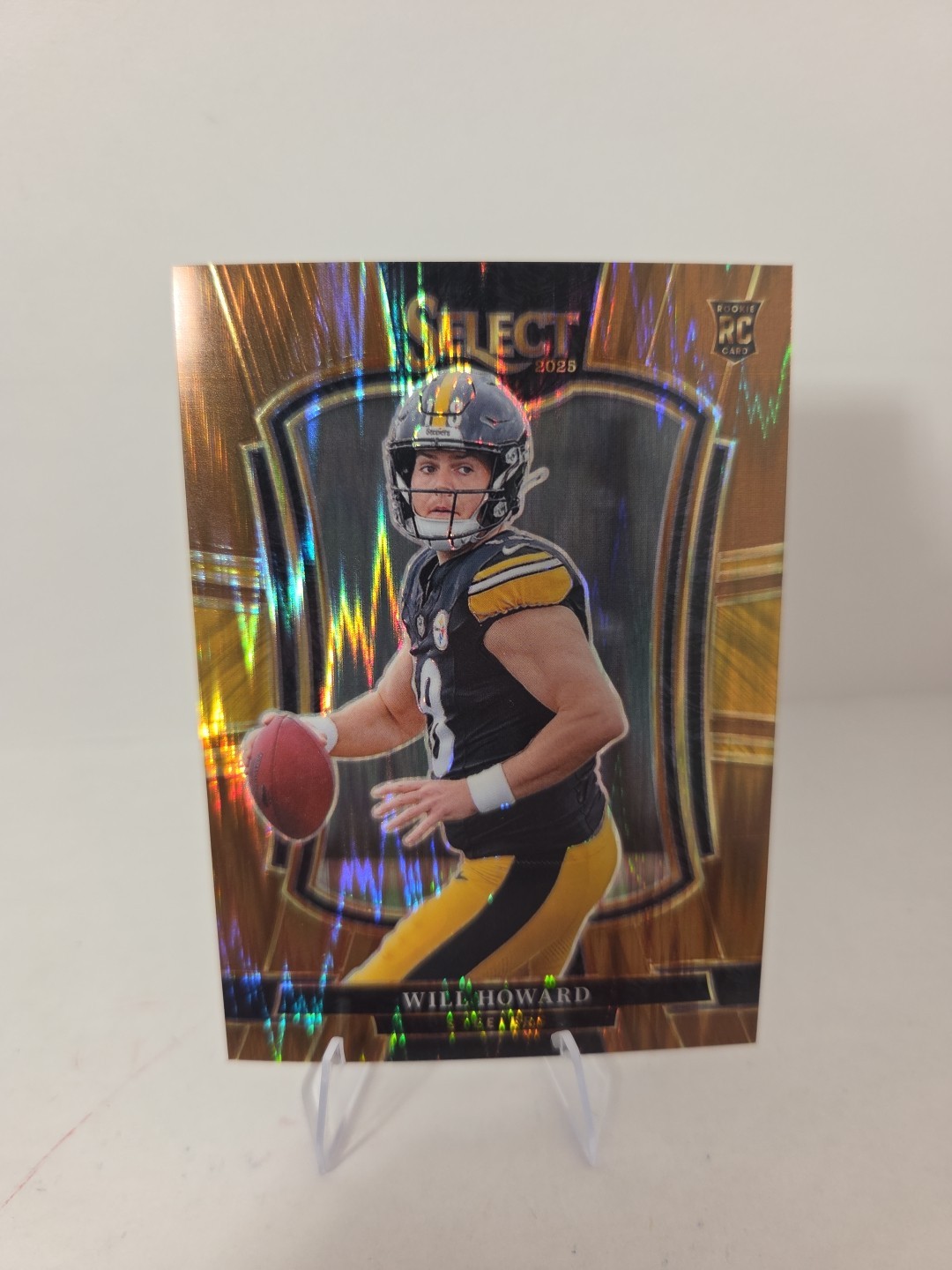 2025 Panini Select - Premier Level Will Howard #152 Copper Shock Prizm /899 (RC)