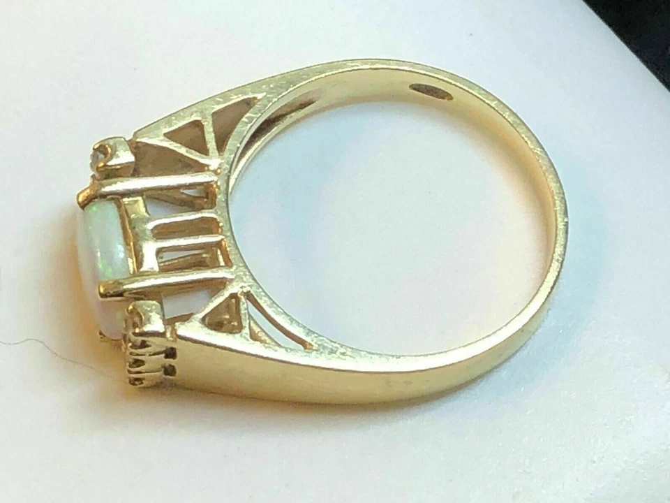 Anillo de compromiso vintage de diamantes de ópalo de fuego de 2,20 quilates enchapado en oro amarillo de 14 quilates Foto 2 de 4