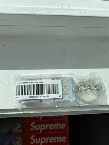 Porte clés transparent Supreme Cash Money Stack Paperweight FW24 neuf expédition le jour même