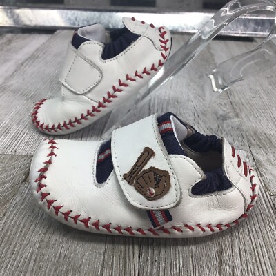 white leather baseball boots