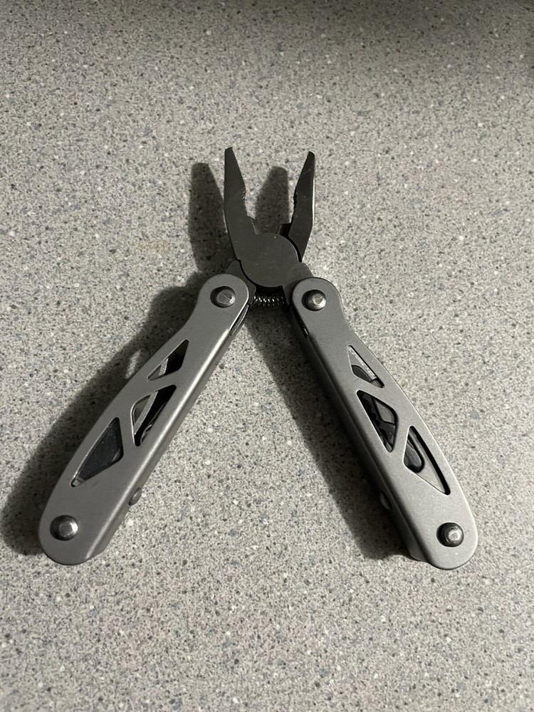 Compact Multi-Tool Knife with Screwdriver and Pliers