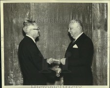 1964 Press Photo George Alphonse Fox gets Gold Pass Award from Wayne Johnston