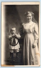 POSTCARD RPPC Mother and Child Playing Horn Studio Photo AZO 1904-18