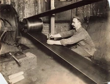 Servicing Factory Equipment c1910s Press Photo Worker Manufacturing Belt a*P176c