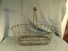 Primitive black metal wire oval basket 6" h x 18" w fruit veggies eggs gathering