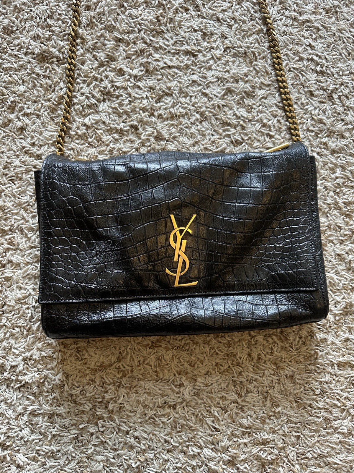 Borsa a tracolla Saint Laurent reversibile Kate con interno in pelle di pitone.