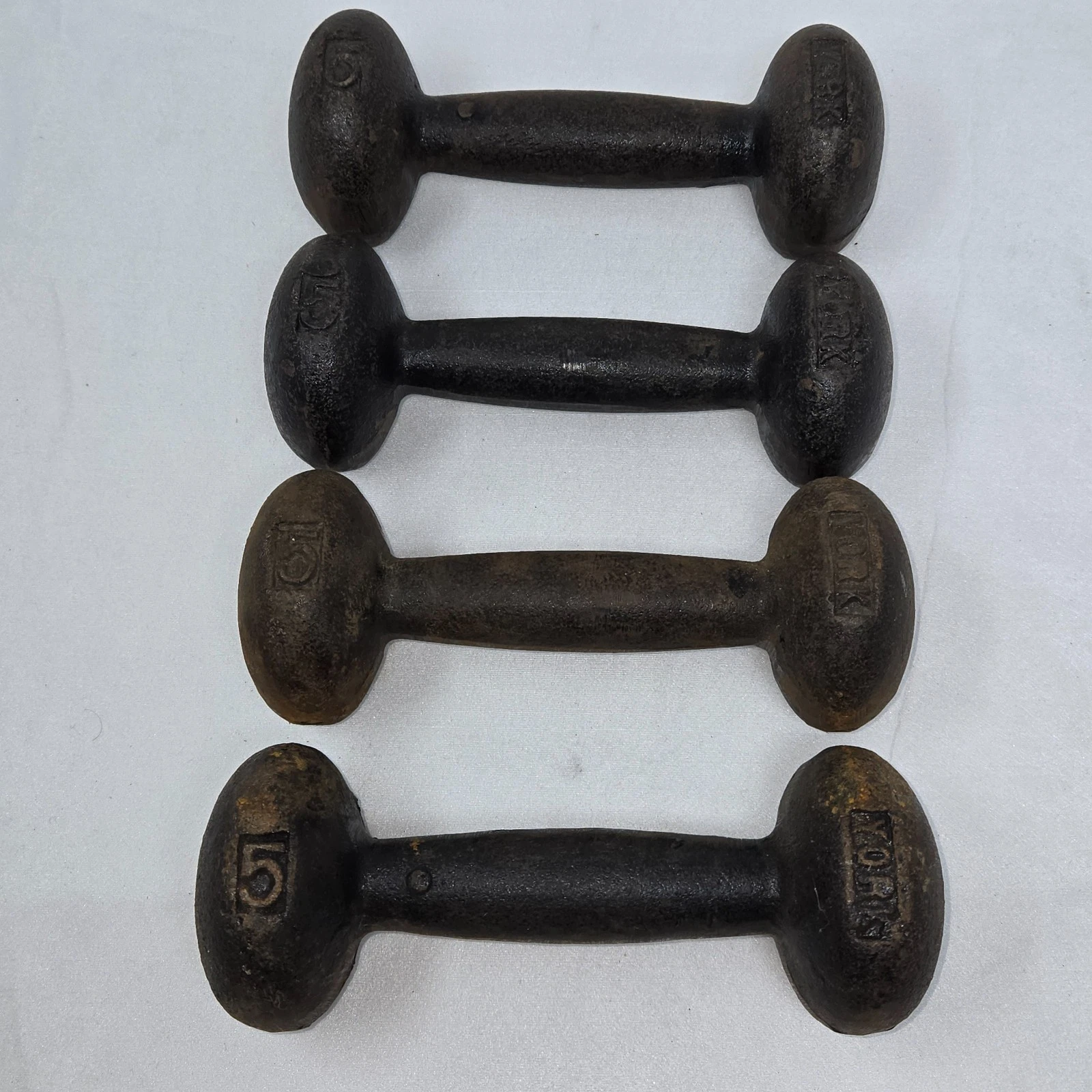 VINTAGE YORK BARBELL 5 Lb CAST IRON DUMBBELLS BUN STYLE ROUND HEAD SET OF 4