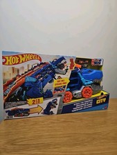 Hot Wheels Ultimate T-Rex Transporter Hauler Transforms NEW