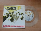 SQUEEZE - ANOTHER NAIL IN MY HEART - 7" P/S SINGLE - CLEAR VINYL - A&M - 1980