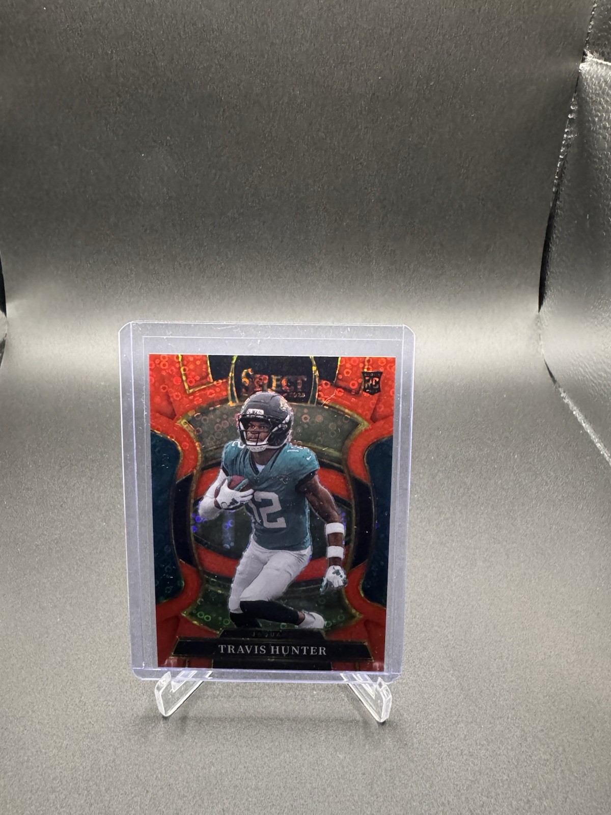 2025 Panini Select - Concourse Travis Hunter #28 Red Disco Prizm /49 (RC)