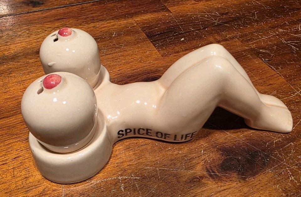 Cheeky vintage ceramic nude figural salt & pepper shakers — risqué retro humor that belongs on every interesting kitchen shelf.
