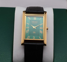 Vintage Seiko Slim Quartz Men's Wrist Watch Green Dial with Black Strap.