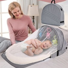 Portable Infant Bassinet with Developmental Toys and Breathable Net Cradle Crib