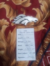 silver pour .999 Denver broncos NFL 1.75 oz 102.86 per troy oz