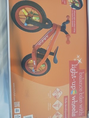 Chillafish BMXIE GLOW Lightweight Balance Bike with Light-Up Wheels Red/orange