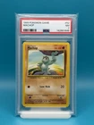 PSA 7 - 1999 POKEMON GAME MACHOP (BASE SET)