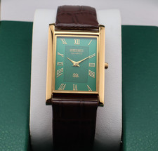Vintage Seiko Slim Quartz Men's Wrist Watch Green Dial with Dark Brown Strap.