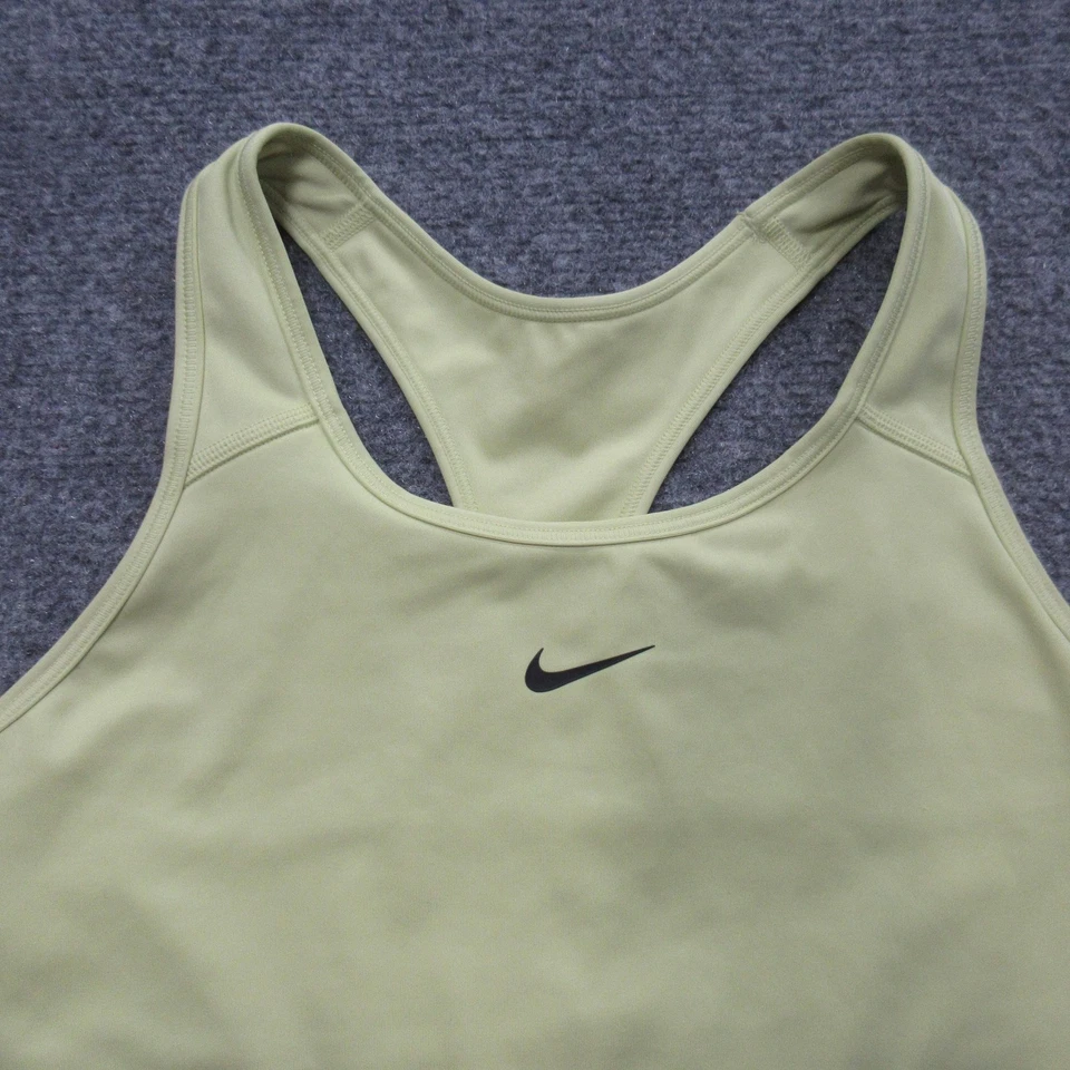 Sujetador deportivo Nike Dri-FIT medio amarillo espalda deportiva entrenamiento gimnasio yoga Foto 2 de 4