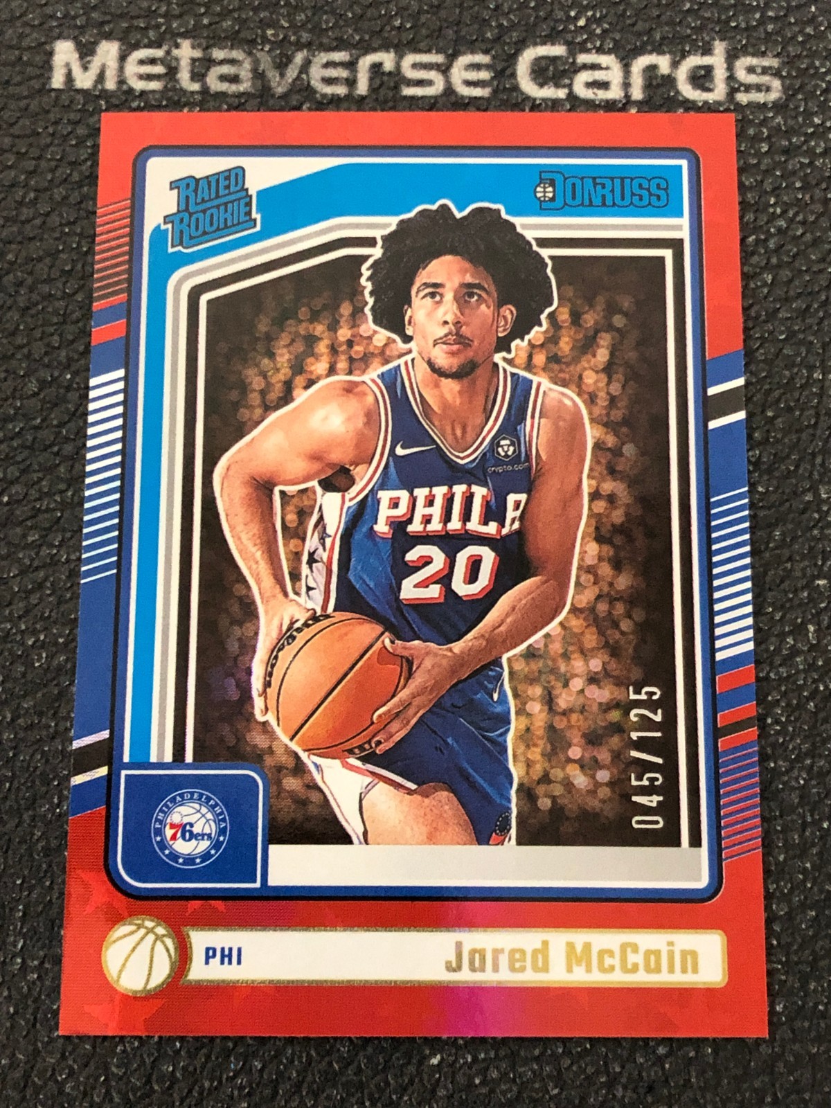 Jared McCain 2024-25 Panini Donruss Rated Rookie Holo Orange Laser 045/125 #228