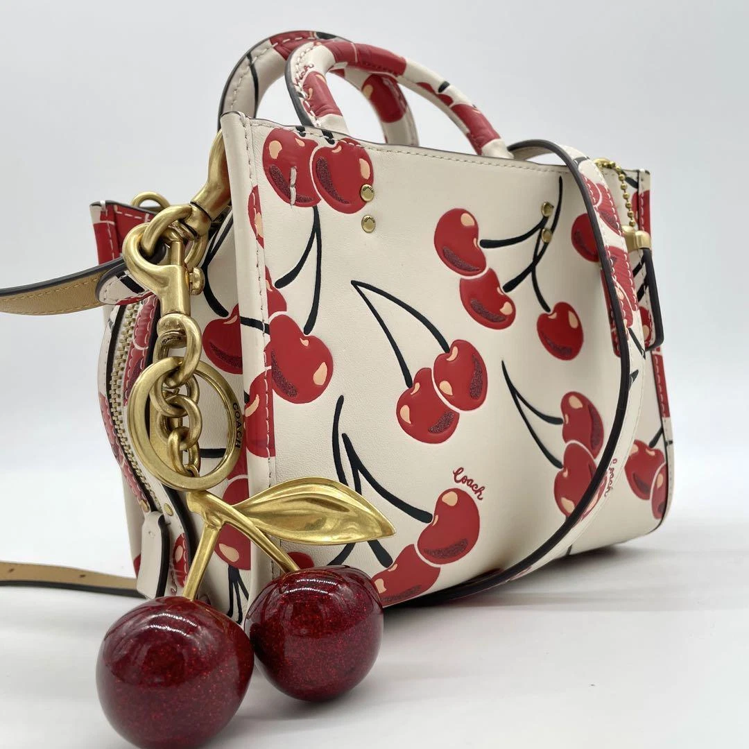 COACH®: Cherry Bag Charm