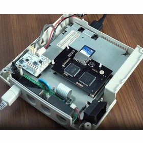 Optical drive emulation board for legacy console with SD card image support