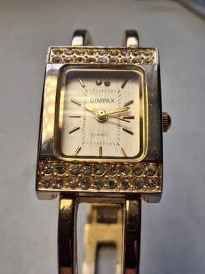 Dimpax Women's  Quartz Watch . Gold Coloured Braslet strip. Working.        80