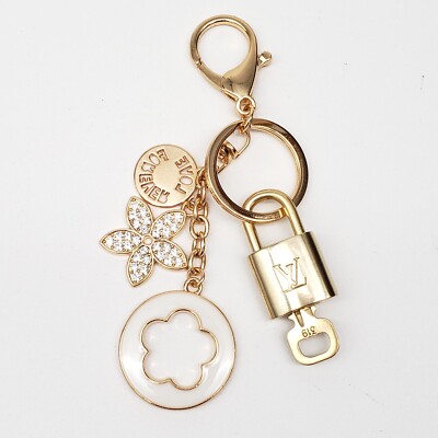 Authentic Louis Vuitton Gold Padlock & Key   w/ Unbranded Flower Keychain