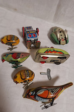 7 x älteres mechanische Spielzeug Blech  Vögel Roboter Auto Frosch