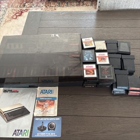 Vintage Atari 2600 Console With 83 Games and (8 Intellivision Games) Not Tested