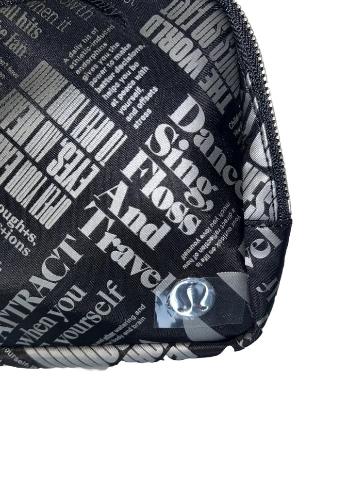 NWT Lululemon Everywhere Belt Bag 1L Black Silver Manifesto Print