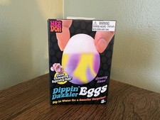 VIRAL NeeDoh Dippin  Dazzler Egg, Nee Doh Color Changing Squish Yellow  Purple