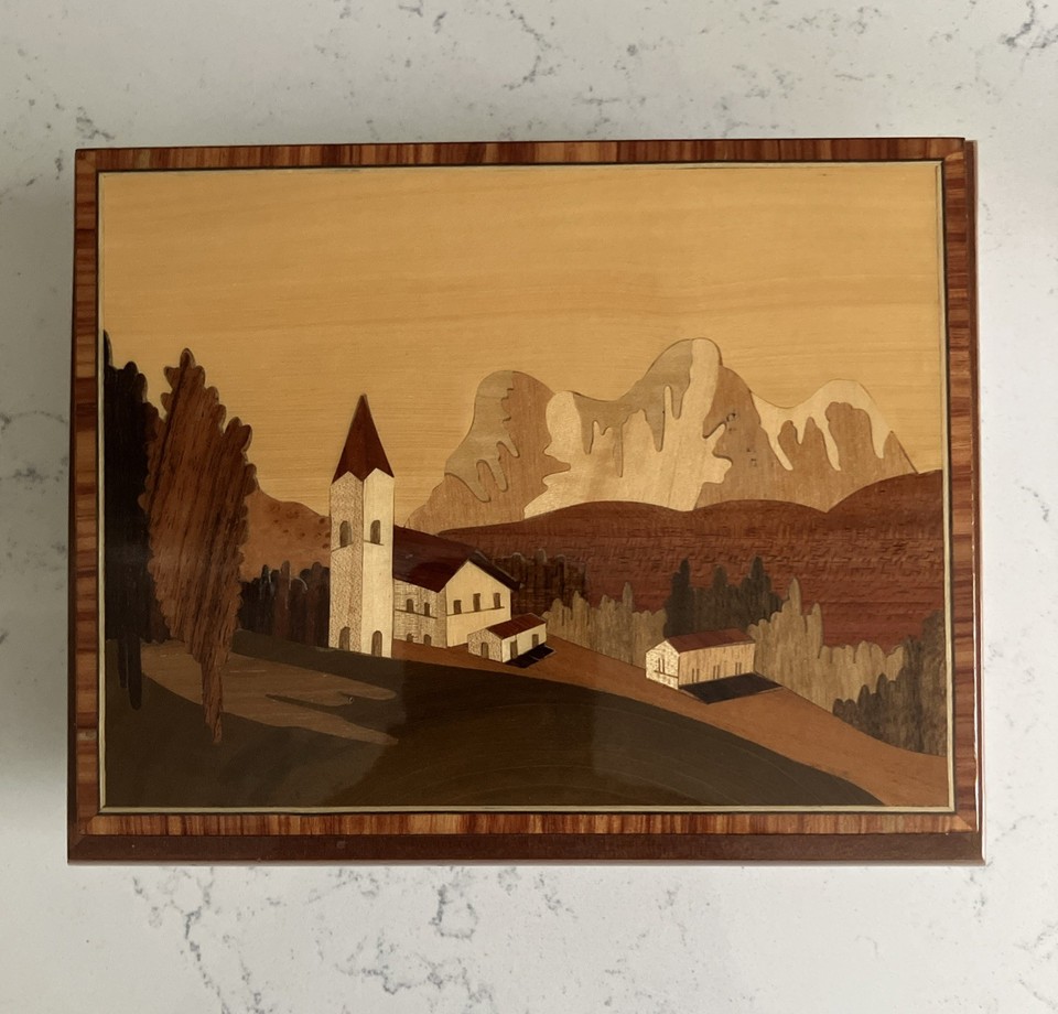 Italian wood-inlay Reuge Swiss movement music box playing 'Fontana di Trevi' — Reuge is the gold standard of music boxes and the Italian marquetry makes this genuinely beautiful.
