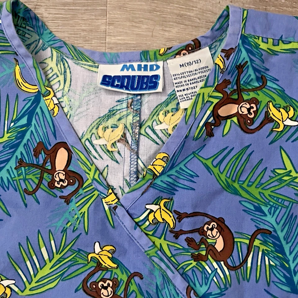 Blusa Médica MHD Estampada de Mono Adulto Mediana Azul Uniforme Bolsillos Foto 3 de 4