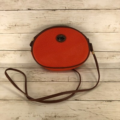 Perry Ellis America Orange Pebbled Crossbody Bag Oval Camera Purse Brown Trim