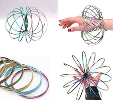 3D Magic Flow Ring Toys Funny Kinetic Spring Arm Slinky Juggle Rainbow Kids Toy